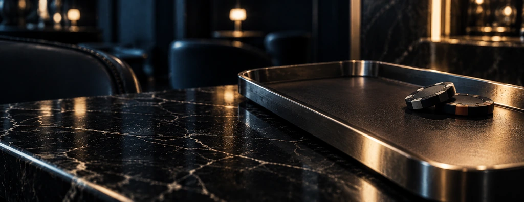 A brushed metal tray with two chips